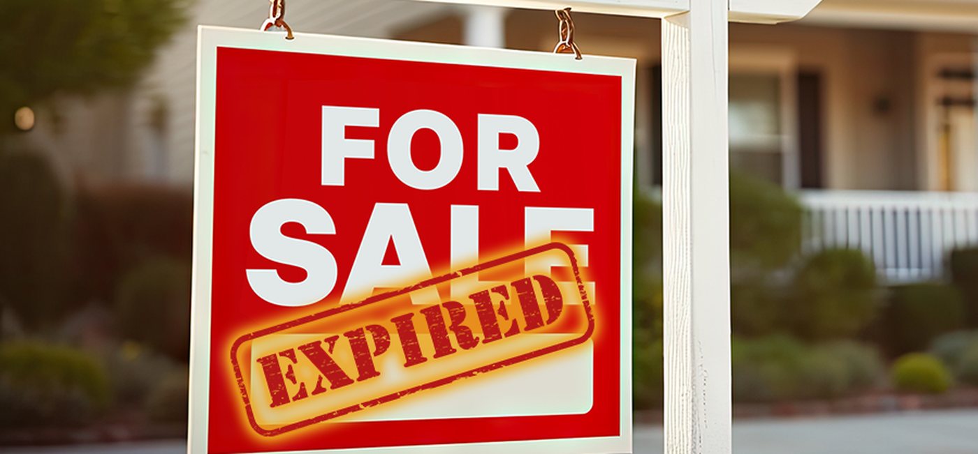 A red HOME FOR SALE sign in front of a house, stamped EXPIRED